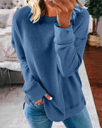 Dame afslappet sweatshirt med rund hals og sidesplit