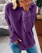 Dame afslappet sweatshirt med rund hals og sidesplit