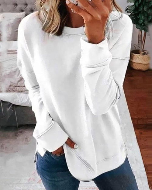 Dame afslappet sweatshirt med rund hals og sidesplit