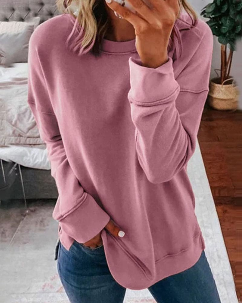Dame afslappet sweatshirt med rund hals og sidesplit