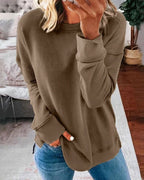 Dame afslappet sweatshirt med rund hals og sidesplit